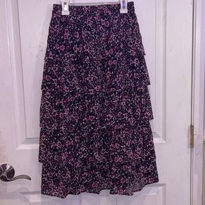 Francesca’s adorable flower skirt at tee length